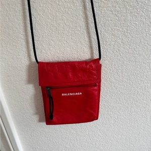 Balenciaga
Explorer cracked leather pouch small handbag